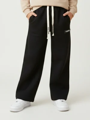 بنطلون سويت بانتس أولادي أسود بقصة واسعة ورباط خصر أبيض متباين