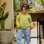 بلوفر تريكو ليموني بفيونكات ملونة – ملابس أطفال بنات شتوي