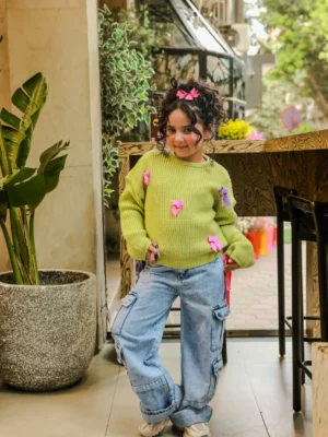 بلوفر تريكو ليموني بفيونكات ملونة – ملابس أطفال بنات شتوي