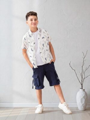 قميص أولادي مطبوع أبيض وكحلي – ملابس أطفال صيفية شيك
